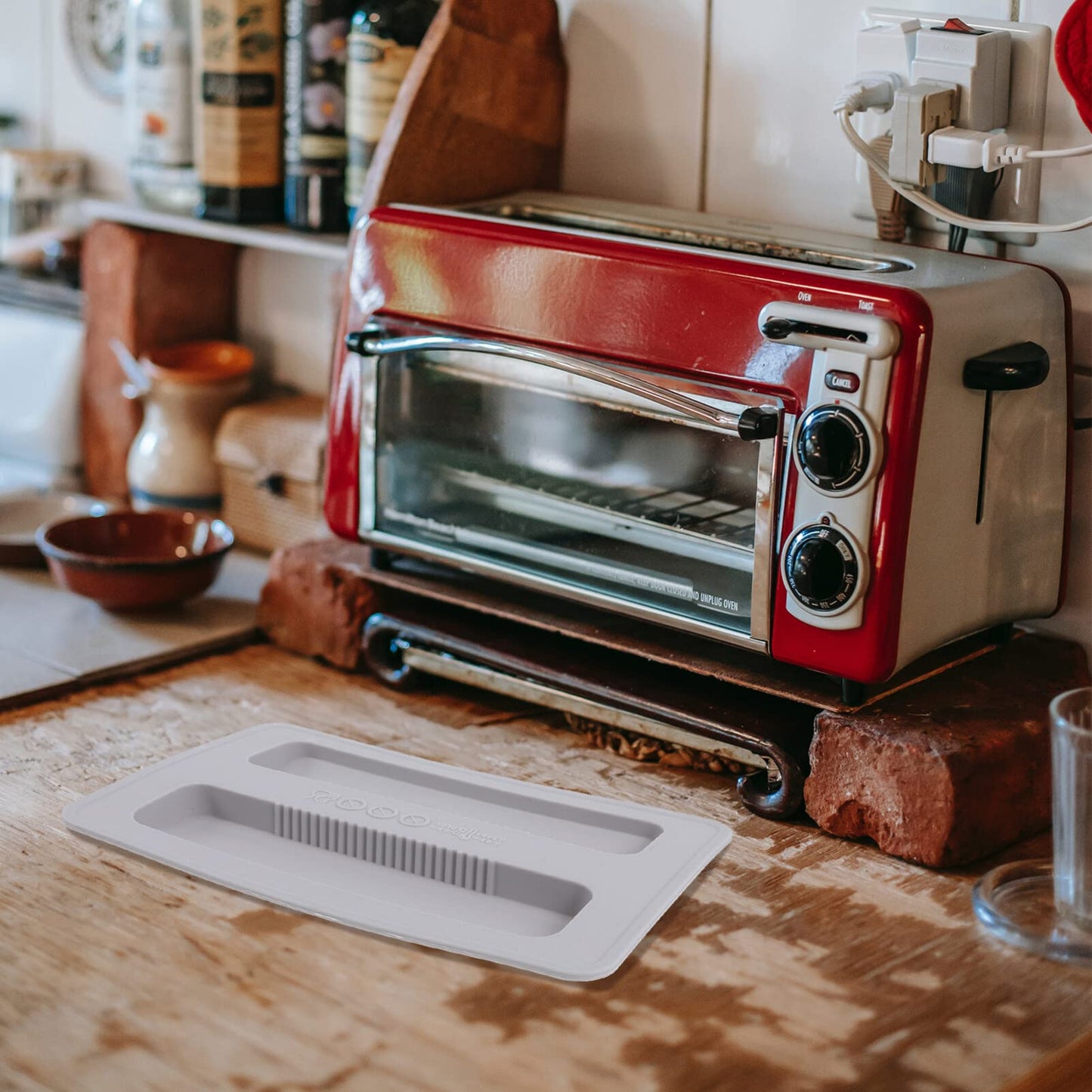 "Schutz für Ihren Toaster: Graue Silikon-Abdeckung für längere Lebensdauer"