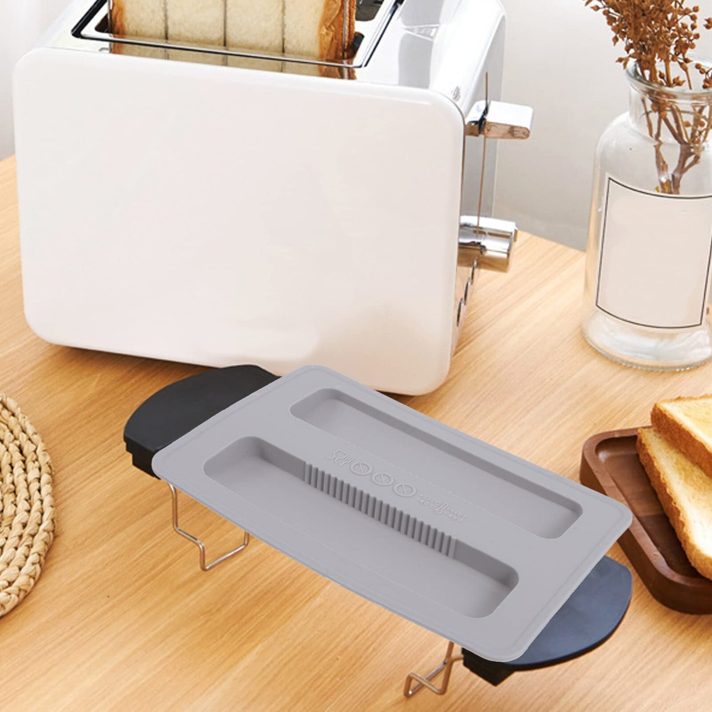 "Schutz für Ihren Toaster: Graue Silikon-Abdeckung für längere Lebensdauer"